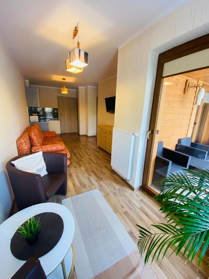 Pokoje Goscinne Pod Jabloniami Augustów Esterno foto